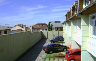 Imagem: A casa em condomínio possui 3 Dormitórios, 4 Banheiros, 2