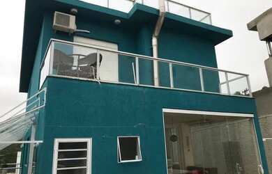 Imagem: A casa em condomínio possui 3 Dormitórios, 4 Banheiros, 4