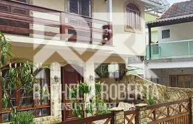 Imagem: A casa possui 5 Dormitórios, 5 Banheiros, 2 Vagas na garagem