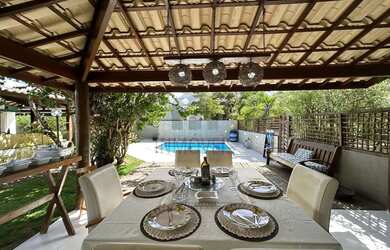 Imagem: A casa em condomínio possui 4 Dormitórios, 5 Banheiros, 5