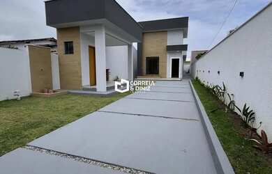 Imagem: A casa possui 3 Dormitórios, 3 Banheiros, 3 Vagas na garagem