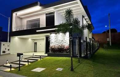 Imagem: A casa possui 3 Dormitórios, 4 Banheiros, 4 Vagas na garagem