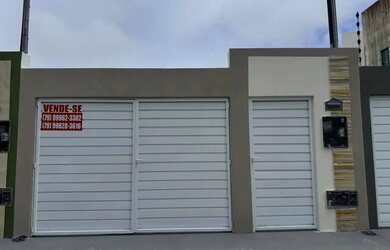 Imagem: A casa possui 3 Dormitórios, 1 Banheiro, 2 Vagas na garagem