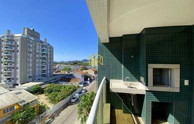 Imagem: O apartamento possui 3 Dormitórios, 2 Banheiros, 2 Vagas na