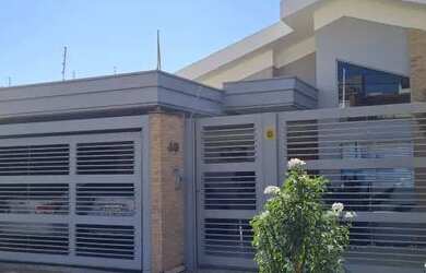 Imagem: A casa possui 3 Dormitórios, 4 Banheiros, 3 Vagas na garagem