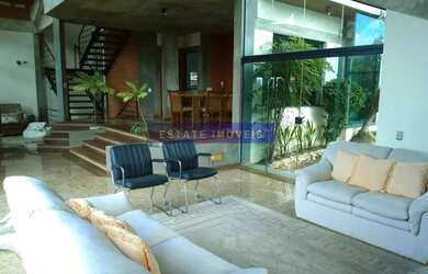 Imagem: A casa em condomínio possui 4 Dormitórios, 5 Banheiros, 500m²