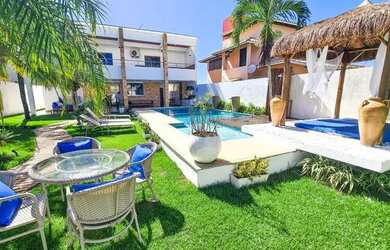 Imagem: A casa em condomínio possui 5 Dormitórios, 5 Banheiros, 3