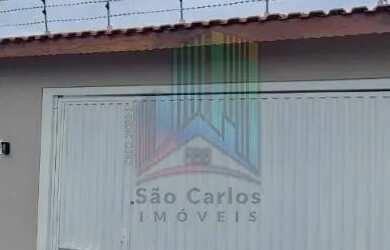 Imagem: A casa possui 3 Dormitórios, 2 Banheiros, 4 Vagas na garagem