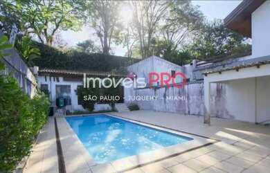 Imagem: A casa possui 3 Dormitórios, 5 Banheiros, 3 Vagas na garagem