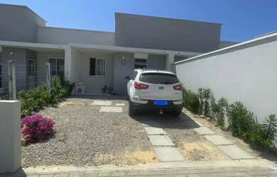 Imagem: A casa possui 2 Dormitórios, 1 Banheiro, 2 Vagas na garagem