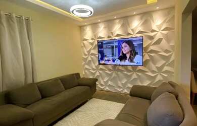 Imagem: A casa possui 4 Dormitórios, 2 Banheiros, 2 Vagas na garagem