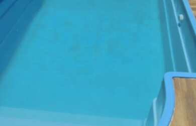 Imagem: A casa possui 2 Dormitórios, Acomodam 8 pessoas, 3 Vagas na