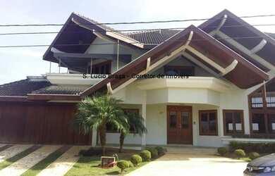 Imagem: A casa em condomínio possui 5 Dormitórios, 4 Banheiros, 4