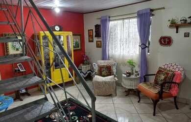 Imagem: A casa possui 3 Dormitórios, 2 Banheiros, 76m² de Área e