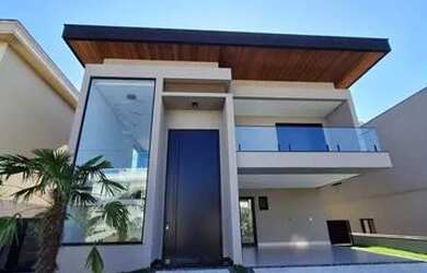 Imagem: A casa em condomínio possui 4 Dormitórios, 5 Banheiros, 4