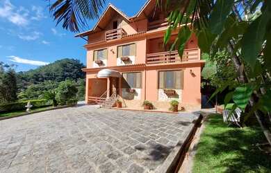 Imagem: A casa possui 5 Dormitórios, 5 Banheiros, 5 Vagas na garagem