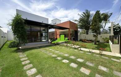 Imagem: A casa em condomínio possui 4 Dormitórios, 5 Banheiros, 420m²