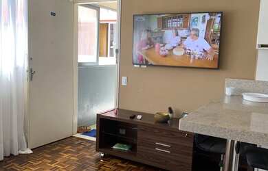 Imagem: O apartamento possui 2 Dormitórios, Acomodam 5 pessoas, 2 Vagas