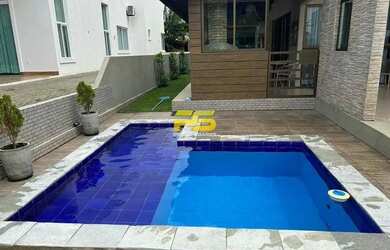 Imagem: A casa em condomínio possui 5 Dormitórios, 5 Banheiros, 2