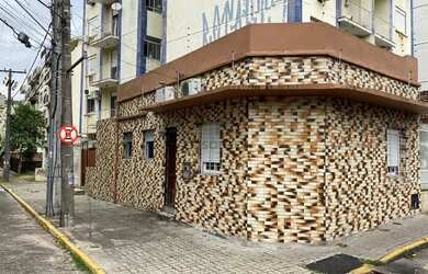 Imagem: A casa possui 2 Dormitórios, 1 Banheiro e 53m² de Área e