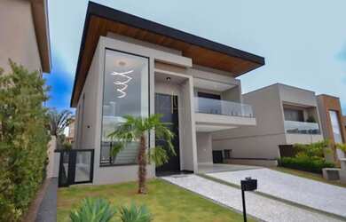 Imagem: A casa em condomínio possui 4 Dormitórios, 5 Banheiros, 4