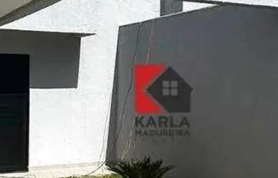 Imagem: A casa possui 3 Dormitórios, 3 Banheiros, 2 Vagas na garagem