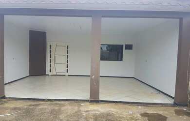 Imagem: A casa possui 2 Dormitórios, 2 Vagas na garagem e está localizado