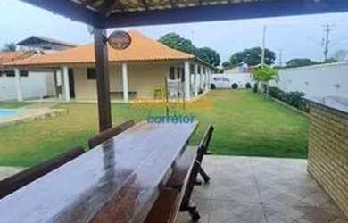 Imagem: A casa possui 3 Dormitórios, 3 Banheiros, 4 Vagas na garagem