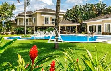 Imagem: A casa possui 5 Dormitórios, 5 Banheiros, 700m² de Área