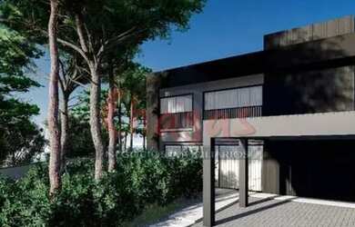 Imagem: A casa possui 5 Dormitórios, 3 Banheiros, 2 Vagas na garagem