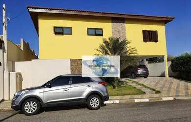 Imagem: A casa em condomínio possui 4 Dormitórios, 5 Banheiros, 4