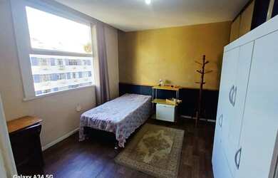 Imagem: Aluguel de quarto individual com vista para a praia, rua do