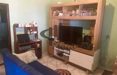 Imagem: A casa possui 2 Dormitórios, 3 Banheiros, 4 Vagas na garagem