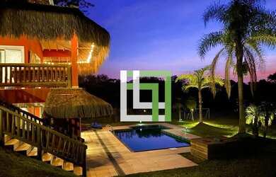 Imagem: A casa possui 4 Dormitórios, 5 Banheiros, 750m² de Área e