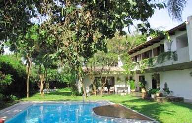 Imagem: A casa em condomínio possui 5 Dormitórios, 5 Banheiros, 5