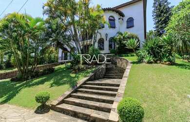 Imagem: A casa em condomínio possui 4 Dormitórios, 5 Banheiros, 4