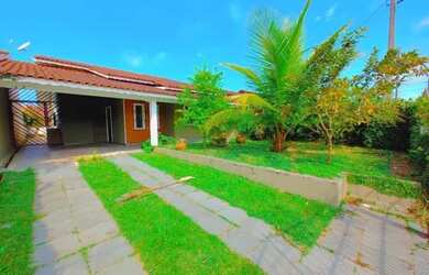 Imagem: A casa possui 3 Dormitórios e 3 Vagas na garagem e está localizado