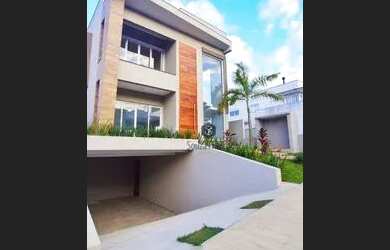 Imagem: A casa em condomínio possui 3 Dormitórios, 3 Banheiros, 4