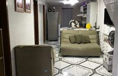 Imagem: A casa possui 3 Dormitórios, 1 Banheiro e está localizado