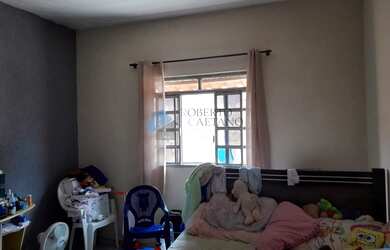 Imagem: A casa possui 2 Dormitórios, 1 Banheiro, 1 Vaga na garagem