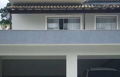 Imagem: A casa possui 3 Dormitórios, 3 Banheiros, 3 Vagas na garagem