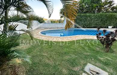 Imagem: A casa em condomínio possui 5 Dormitórios, 5 Banheiros, 3