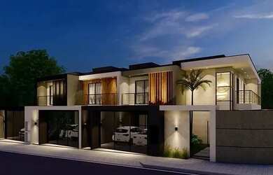 Imagem: A casa possui 3 Dormitórios, 2 Banheiros, 2 Vagas na garagem