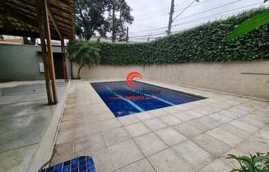 Imagem: A casa possui 3 Dormitórios, 4 Banheiros, 2 Vagas na garagem