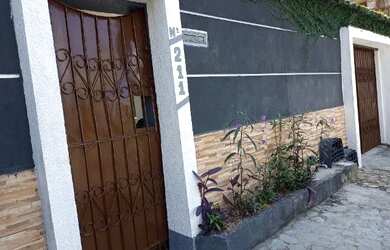 Imagem: A casa possui 2 Dormitórios, 2 Banheiros, 3 Vagas na garagem