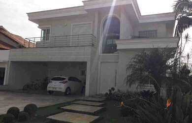 Imagem: A casa em condomínio possui 4 Dormitórios, 5 Banheiros, 4