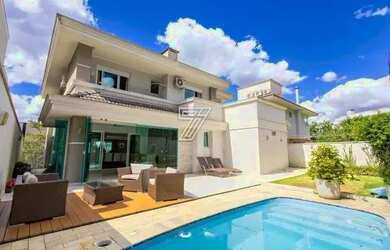 Imagem: A casa em condomínio possui 4 Dormitórios, 5 Banheiros, 4