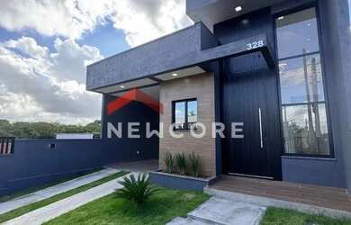 Imagem: A casa possui 3 Dormitórios, 2 Banheiros, 1 Vaga na garagem