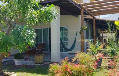 Imagem: A casa em condomínio possui 4 Dormitórios, 3 Banheiros, 2