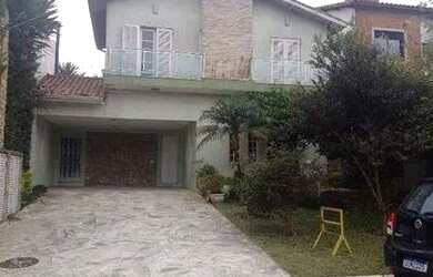 Imagem: A casa em condomínio possui 4 Dormitórios, 4 Banheiros, 4